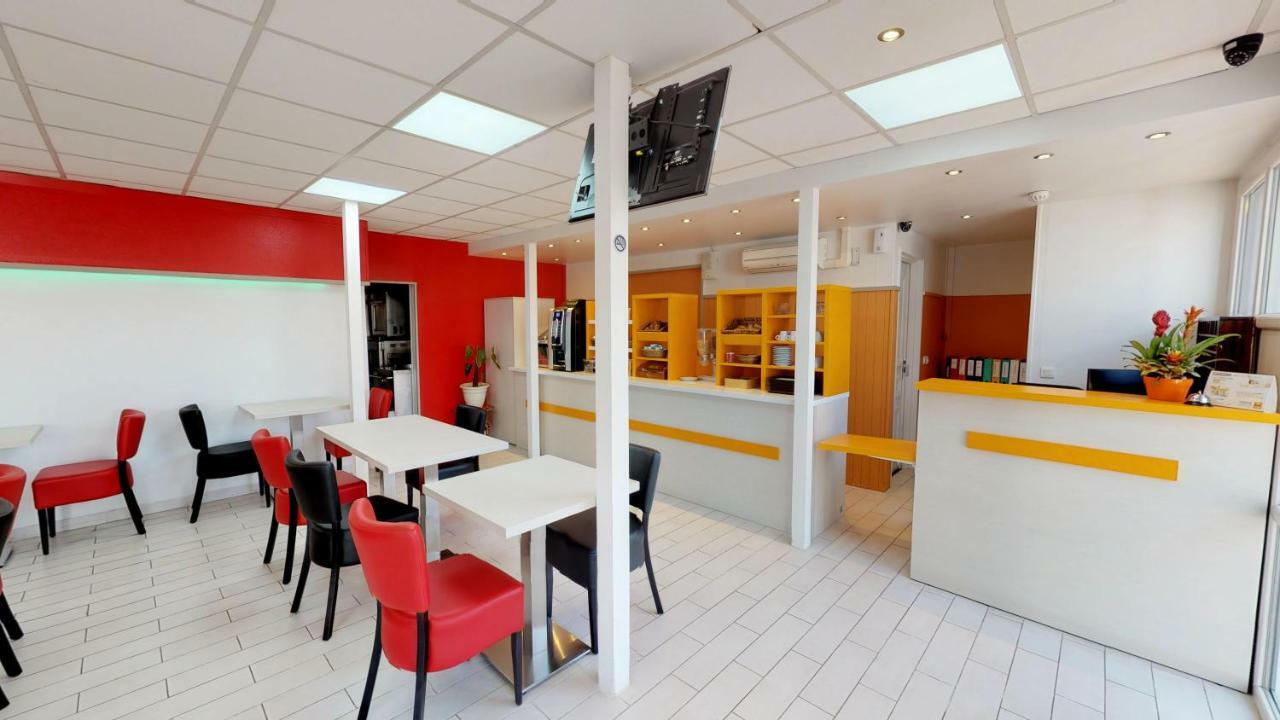 Kyriad Direct Achères Extérieur photo