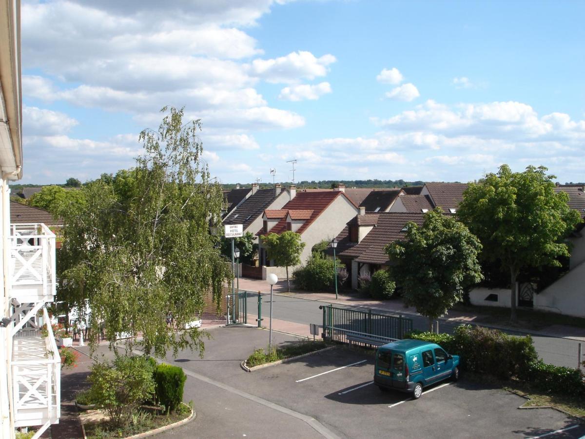 Kyriad Direct Achères Extérieur photo